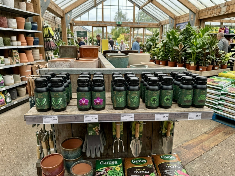Garden centre display stocked with houseplant feeds